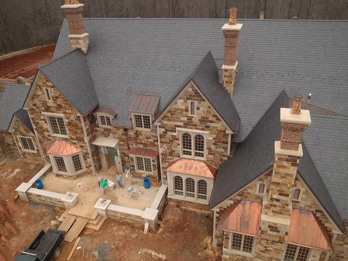 Craftsman Roofing Slate Roof Repair project in Marshfield Center